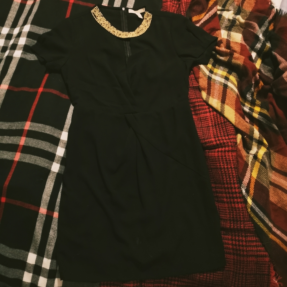 Black, fitted beaded neckline dress